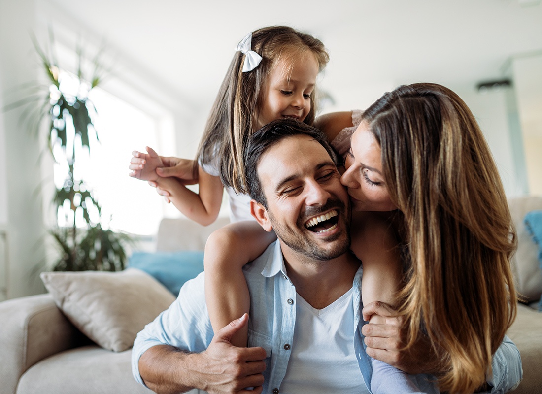Personal Insurance - Happy Family Having Fun Time at Home